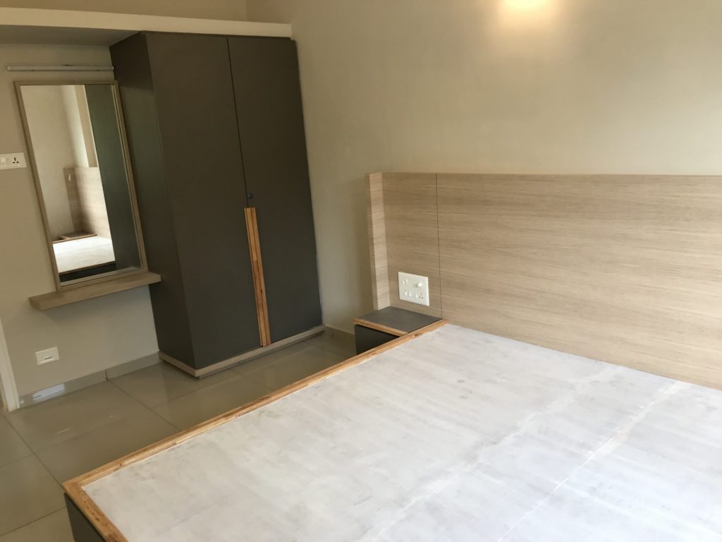 SA Homes bedroom interior with elegant furnishing inside a modern 2 BHK flat